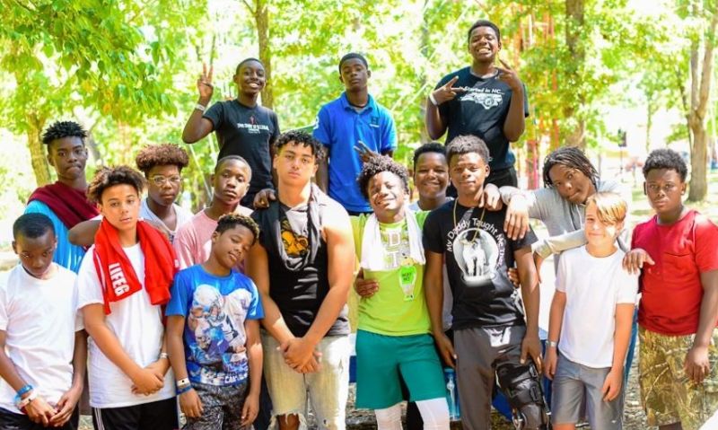 group of boys posing for a photo